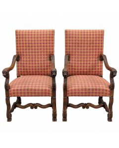 Paire de fauteuils de style Louis XIV en noyer à décor de têtes de lions 1880/1900