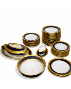 Service en porcelaine de Limoges  doré et cobalt décor Riche Chambon