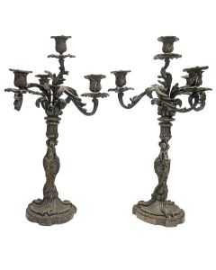 Paire de chandeliers en bronze argenté aux angelots XIXème