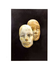 Deux visages / masques : sculpture époque XXème