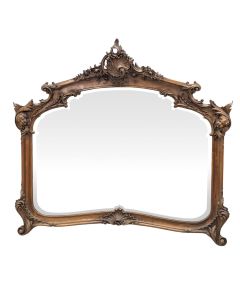 Miroir en bois naturel de style Louis XV à décor d'angelots 