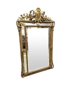 Grande glace à pare closes à décor d'armoirie 