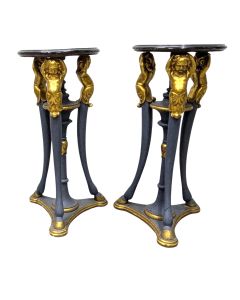 Paire de sellette de style Empire en bois laqué doré