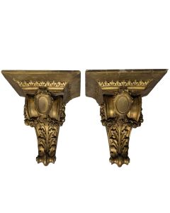 Paire de sellettes murale XIXème platre doré