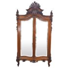 Exceptionnelle armoire à glaces baroque de style Louis XV rocaille en noyer aux bébés