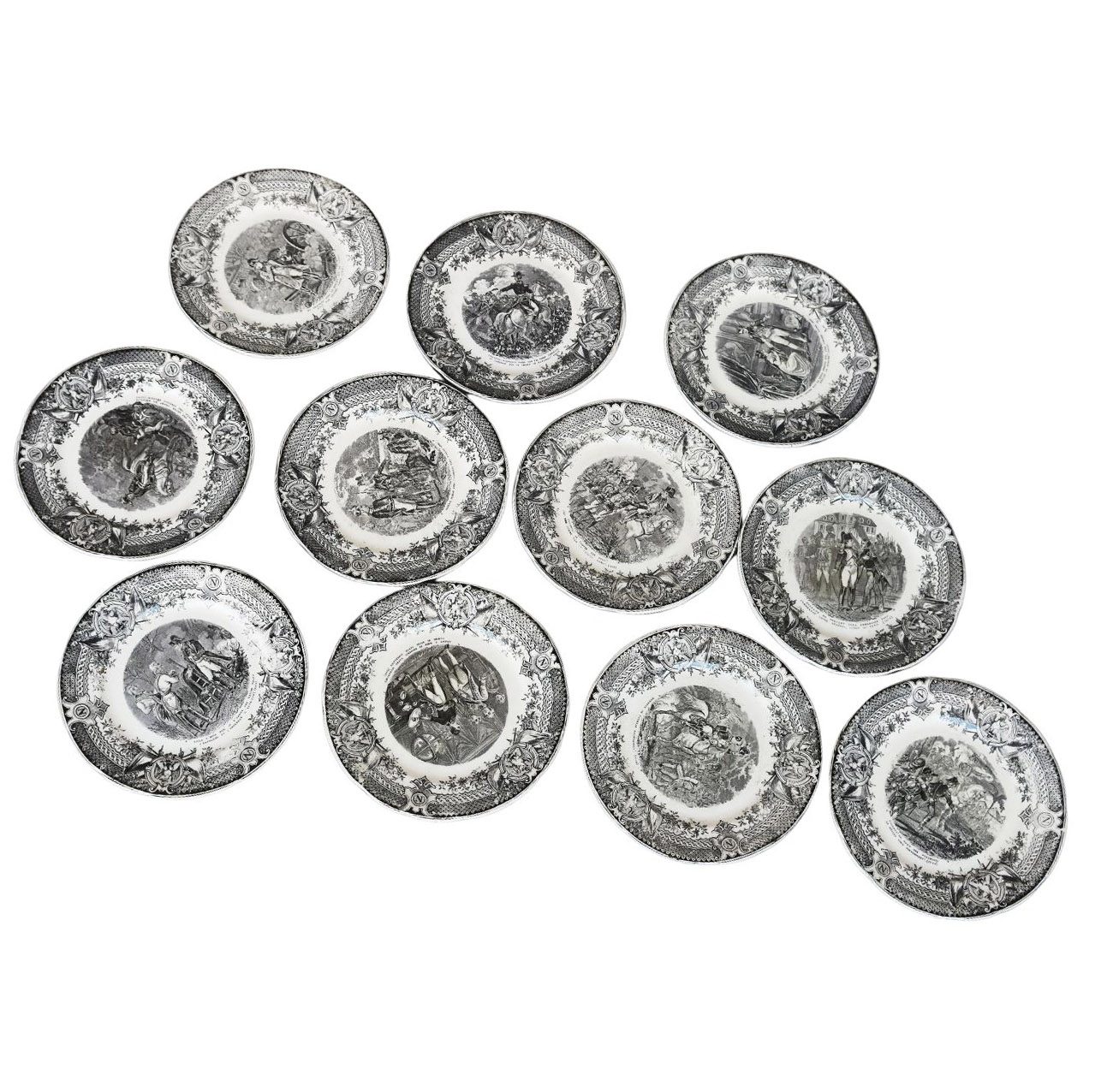 Série de 11 assiettes en porcelaine peinte de Sarreguemines décor batailles